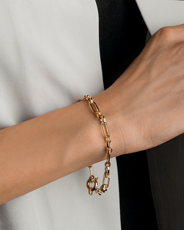 Glimmering Elegance: The Allure of Gold Link Bracelets